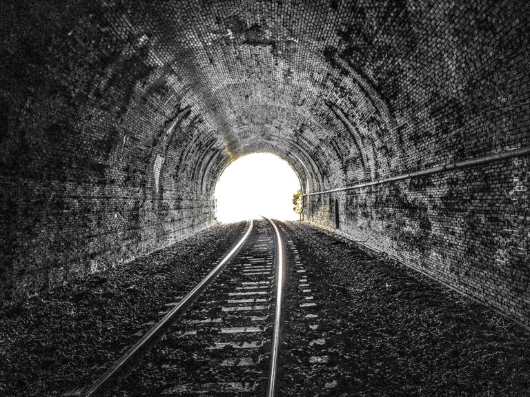 High contrast chiaroscuro lighting technique used in modern minimalist photography.